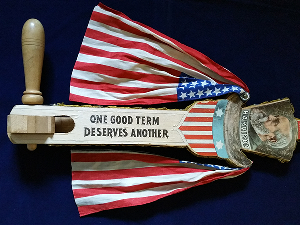 1892 Campaign Rattler for President Benjamin Harrison and Vice Presidential candidate Whitelaw Reid. The side of the rattler in this image shows the quote, 