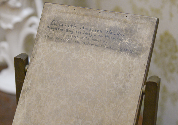 back board of the photo of elizabeth harrison. writing on the back reads 