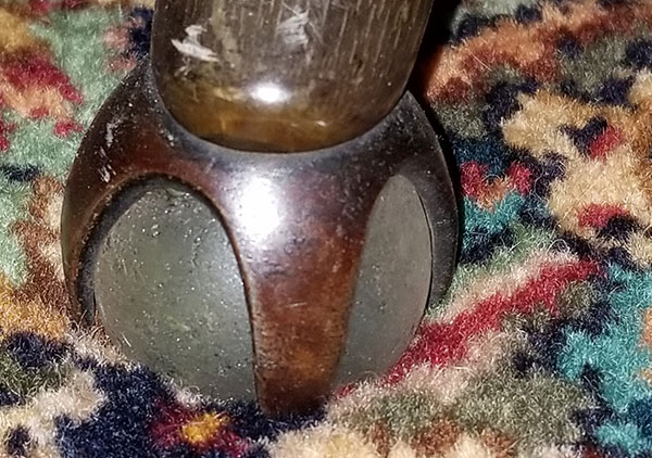 Several plaque on the back and arms of the chair convey the following: Top plaque: 