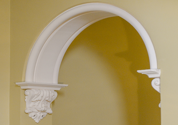 Decorative molding made of plaster that is in several of the hallways of the house. The molding is in archways on the first and second floors in the main halls.